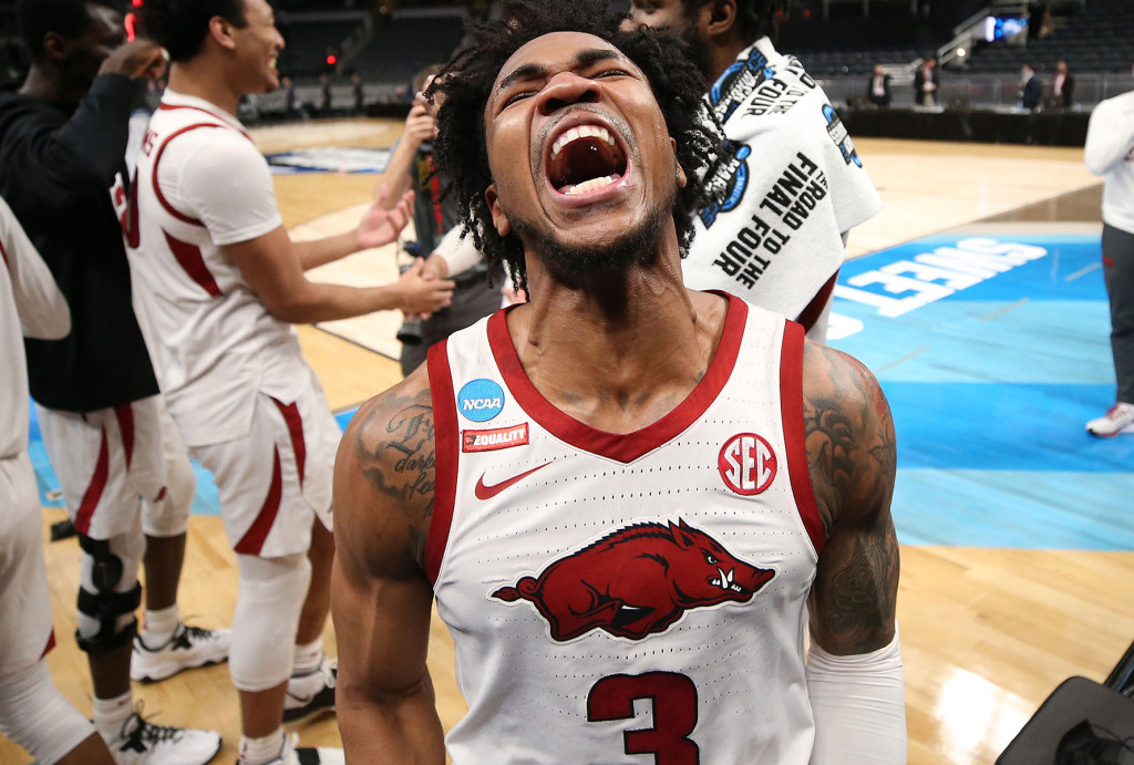 Desii Sills celebrates after Arkansas' 72-70 victory over Oral Roberts.