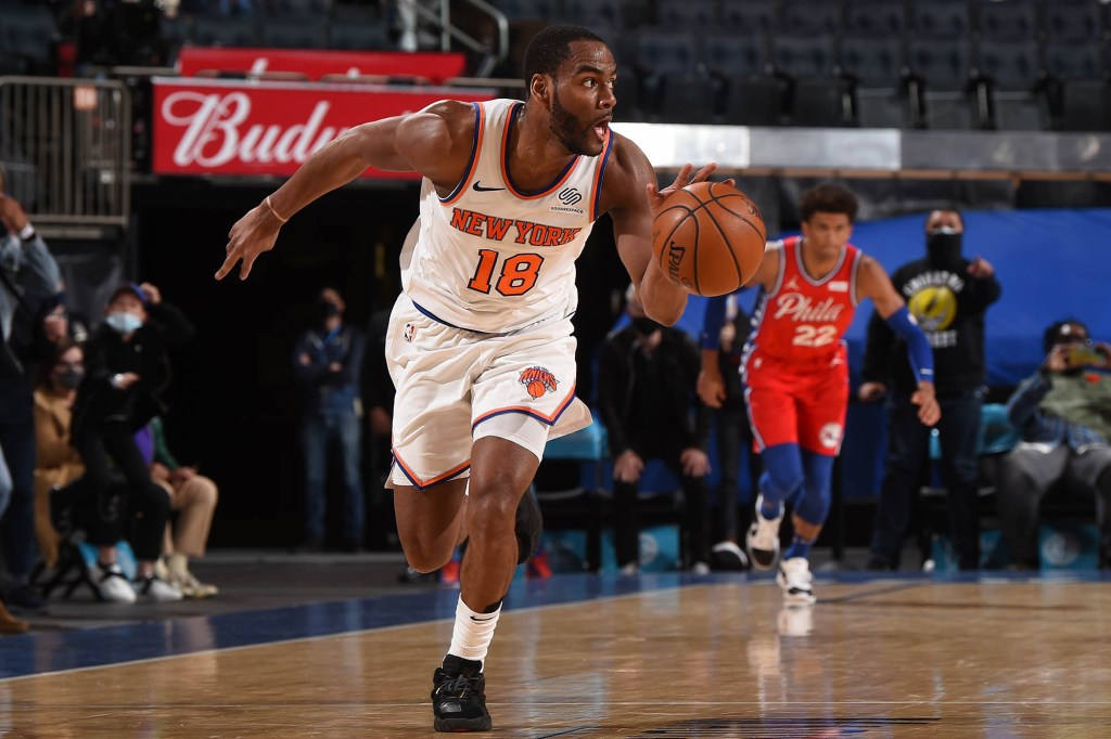 Alec Burks runs the floor against the 76ers.